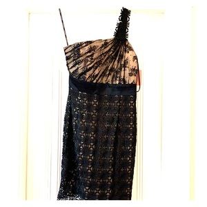 Black and nude cocktail dress.